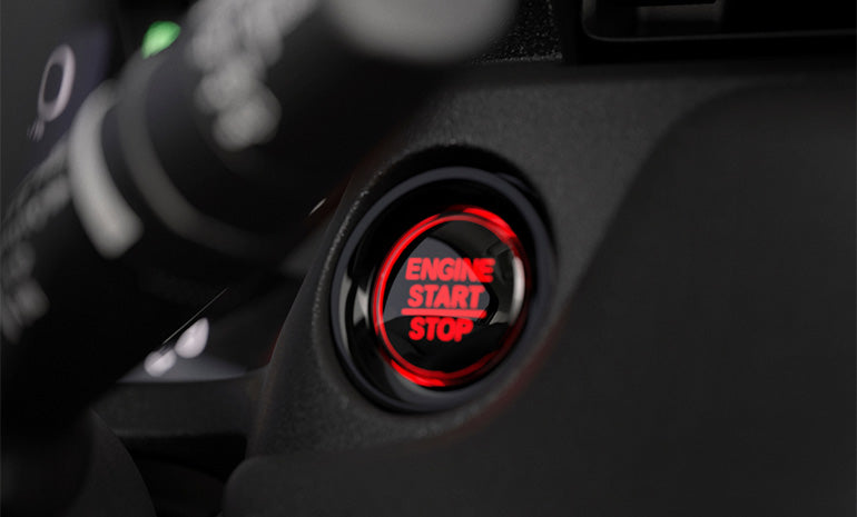 Botón de encendido del motor (START/STOP)